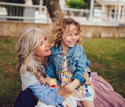 Grandmother and granddaughter enjoying being outside together