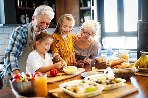 Grandparents cooking with grandkids